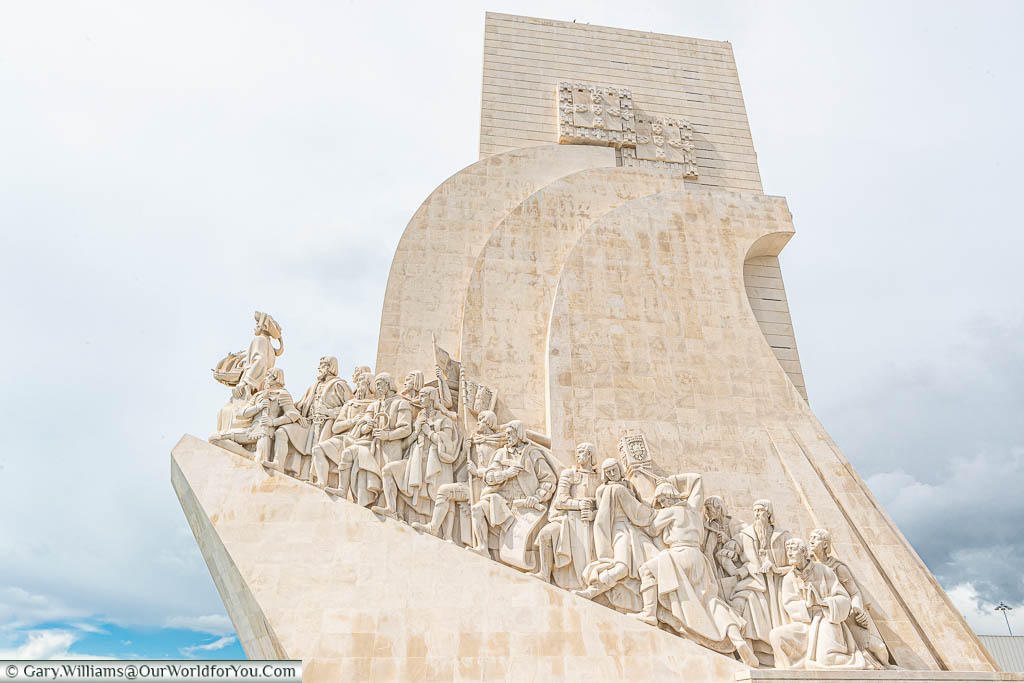 The side profile of the cream stone Monument of the Discoveries in the Belém district of Lisbon, Portugal