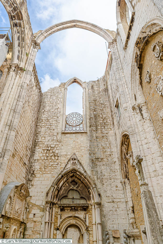 Looking up towards the main window in the ruins of the Carmo convent, Lisbon, Portugal