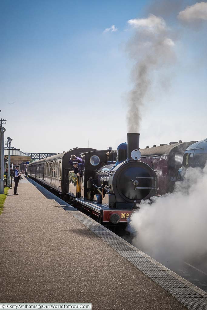 A steam train preparing to depart the Sheringham station at the North Norfolk Railway.