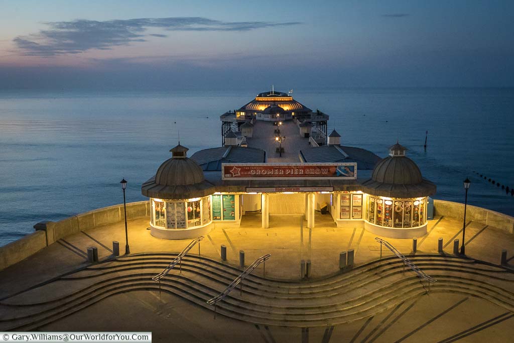 Looking down on the entrance to the illuminated Cromer Pier.