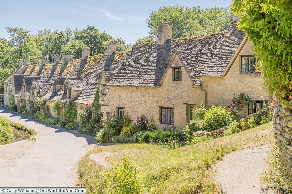 Looking down at the stone cottages of Arlington Row in Bibury