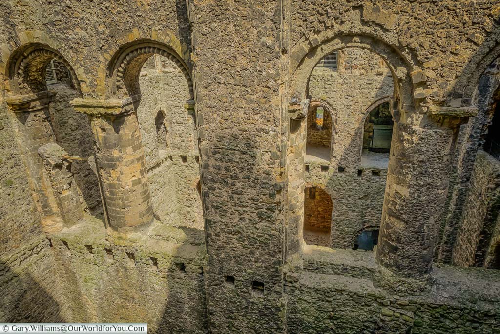 The raw stone arches inside of Rochester castle now open to the elements.