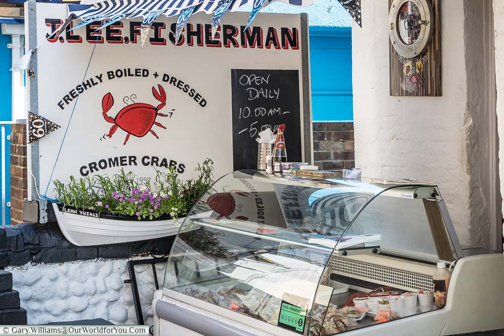 A refrigerated stall selling freshly boiled and dressed Cromer crabs outside a shop in Cromer.