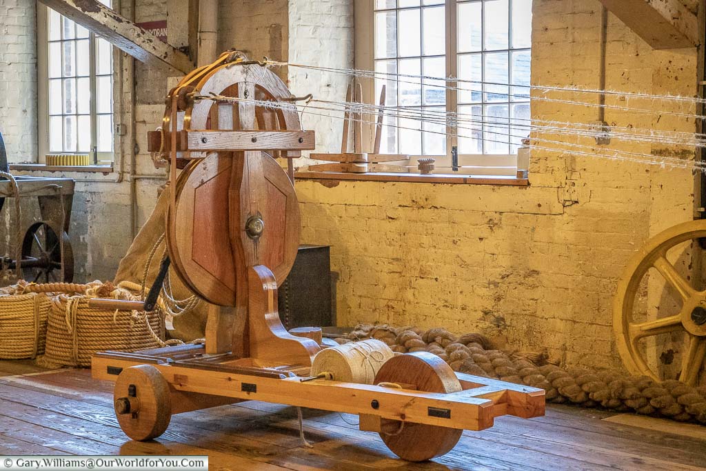 A wooden trolley once used in the rope making process inside the ropery at the Historic Dockyard Chatham