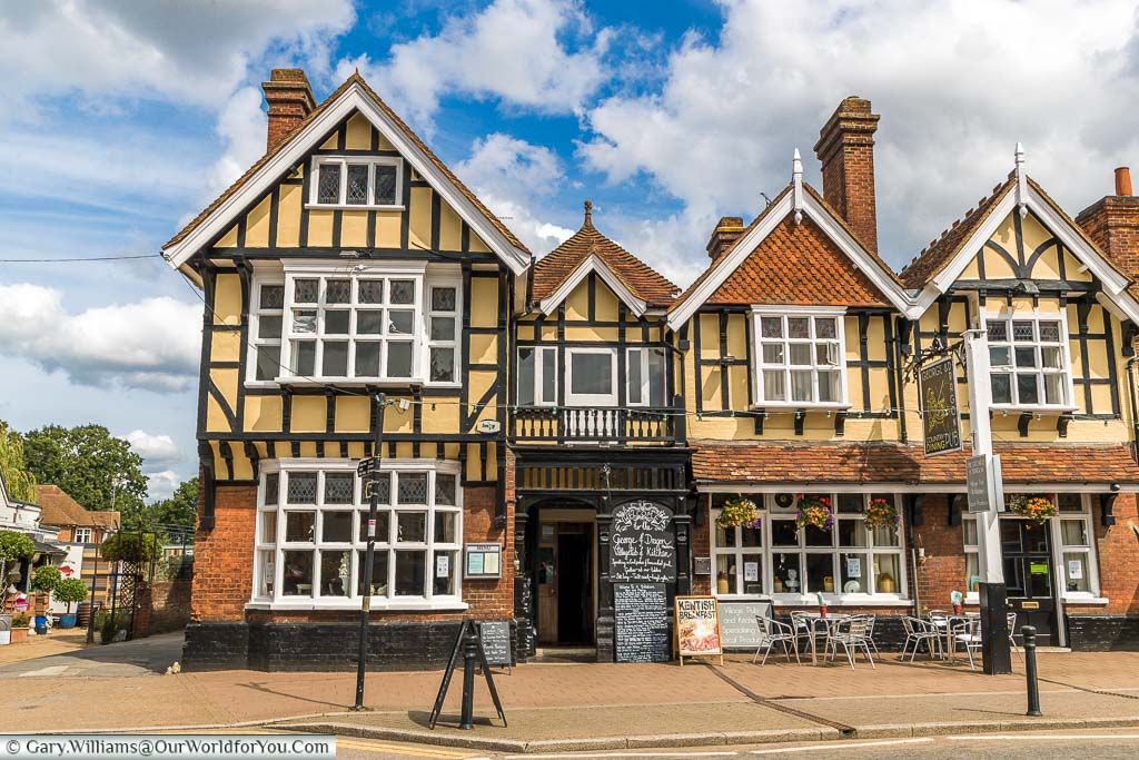 The George and Dragon pub on the High Street built in a Tudor style.