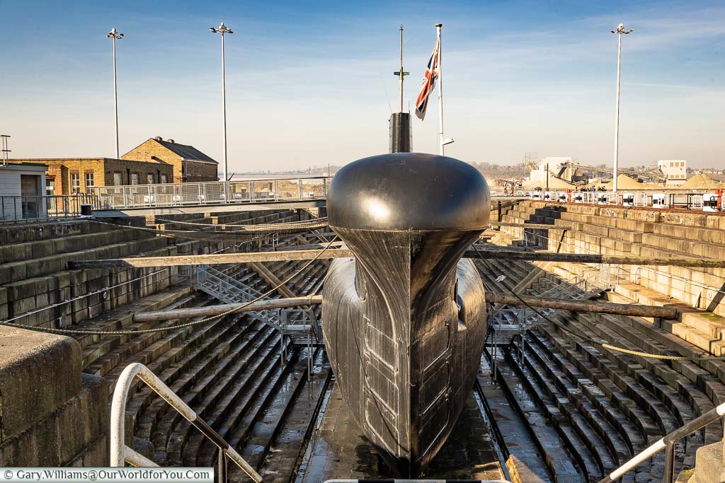 Looking at the bow end of HMS Ocelot in dry dock at Chatham Dockyard