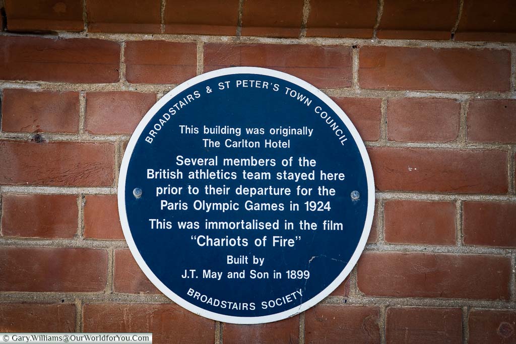 A blue plaque from the Broadstairs and St Peter's town council that tells you that this building was formerly the Carlton Hotel when members of the British athletics team stayed prior to their departure for the 1924 Paris Olympic Games, the story was immortalised in the film Chariots of Fire.
