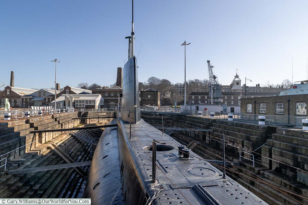 The view from the stern along the length of HMS Ocelot at Chatham Dockyard