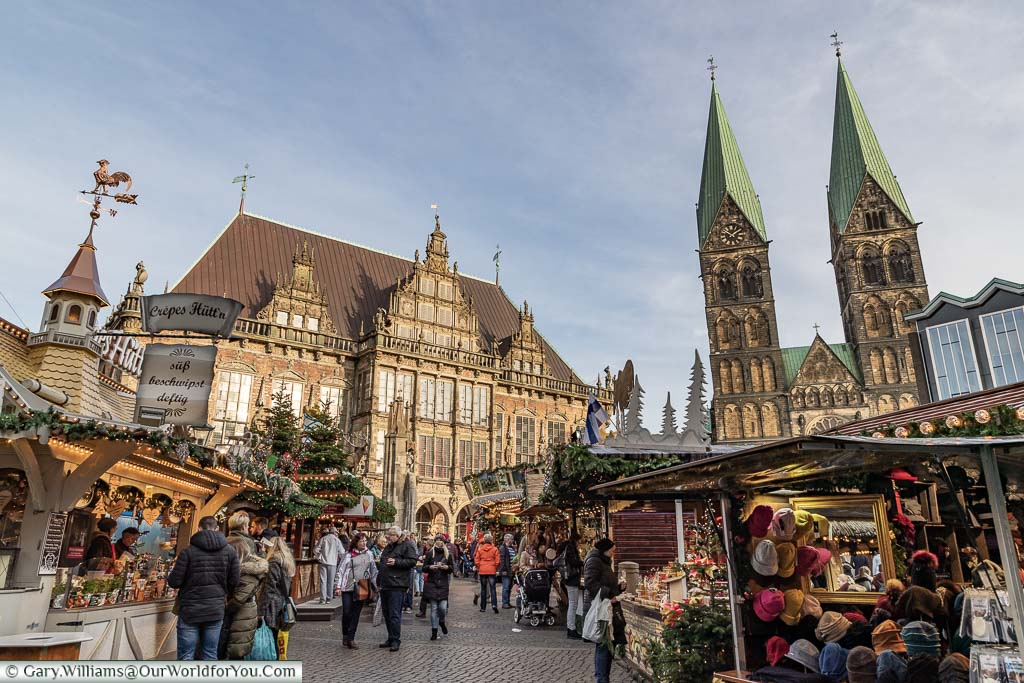 A view through the market in Bremen to the Rathaus and St. Petri Dom.