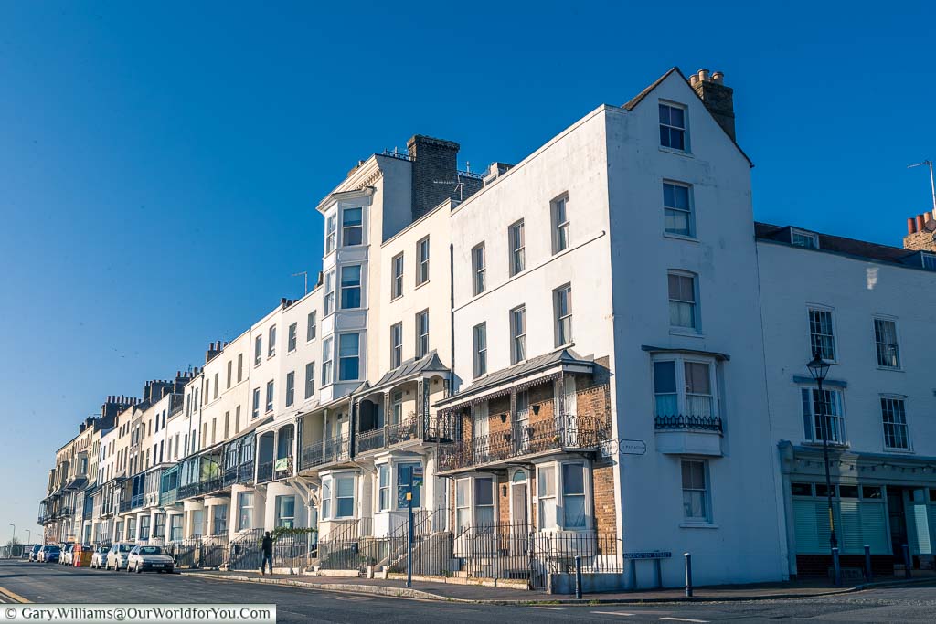 An elegant parade of period houses that face the sea front. Each one has its own covered balcony giving excellent views of the coastline