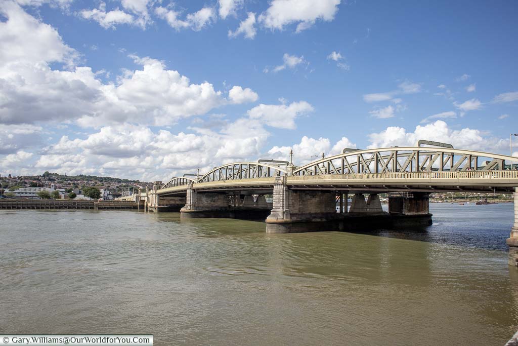 The early 20th Century cast-iron Rochester bridge spanning the river Medway.