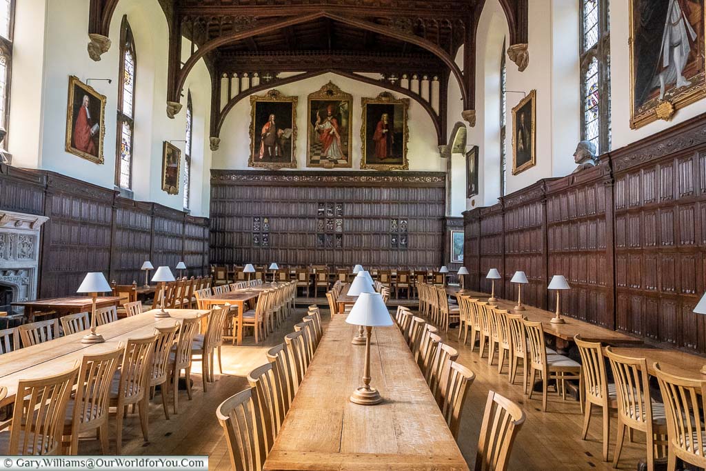 A wood-panelled communal dining hall of Magdalen College, Oxford
