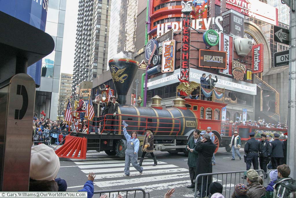 The Macy's Train float heading down Broadway in New York as park of the Thanksgiving Day parade