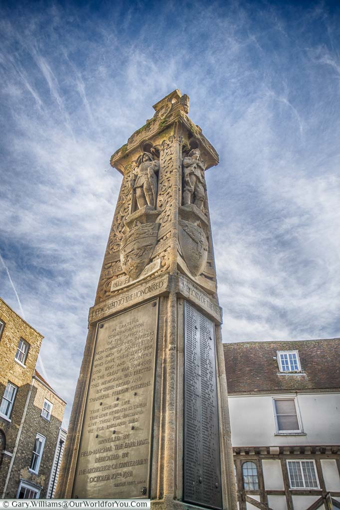 The stone war memorial in the Buttermarket area of Canterbury