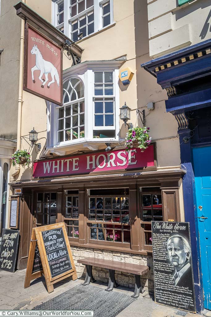 The front of the White Horse pub on Broad Street, with a chalkboard remembering it was a favourite of the fictional Inspector Morse