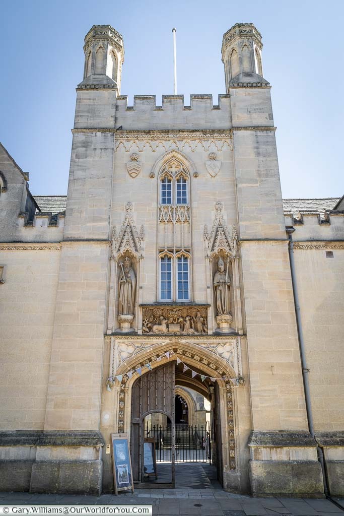 The gated stone tower which is the entrance to Merton College, Oxford