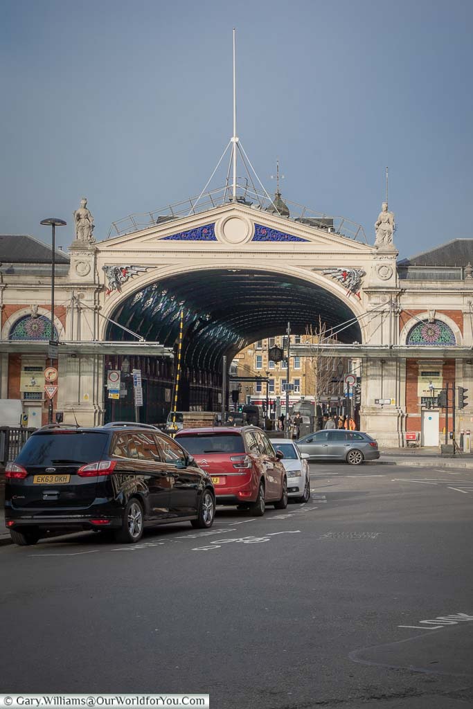 A street view to the Victorian main entrance, with it's cast-iron structure and stone cladding of Smithfield Meat Market in the City of London