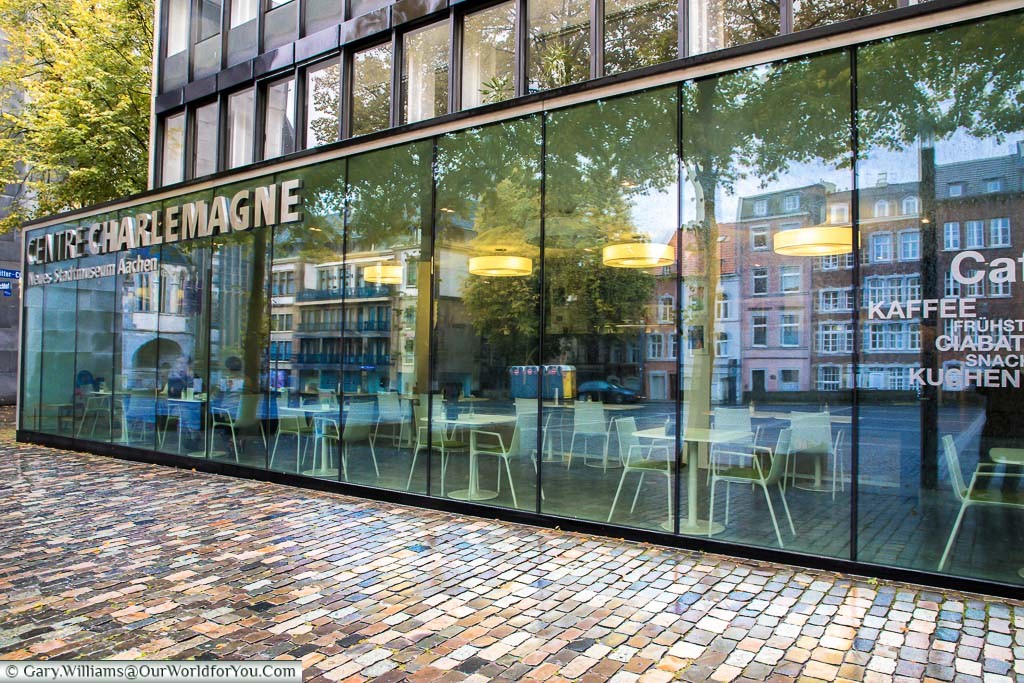 The glass front of the cafe area of the Centre Charlemagne, a fabulous museum that takes you through the cities history. A real must-see when in town.