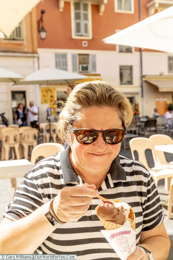A smiling Janis, tucking into an ice-cream cone in Nice