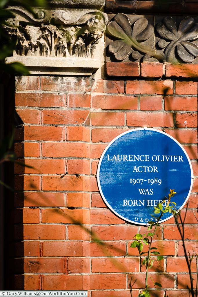 The blue plaque for Laurence Olivier on a home in Wathen Road, Dorking