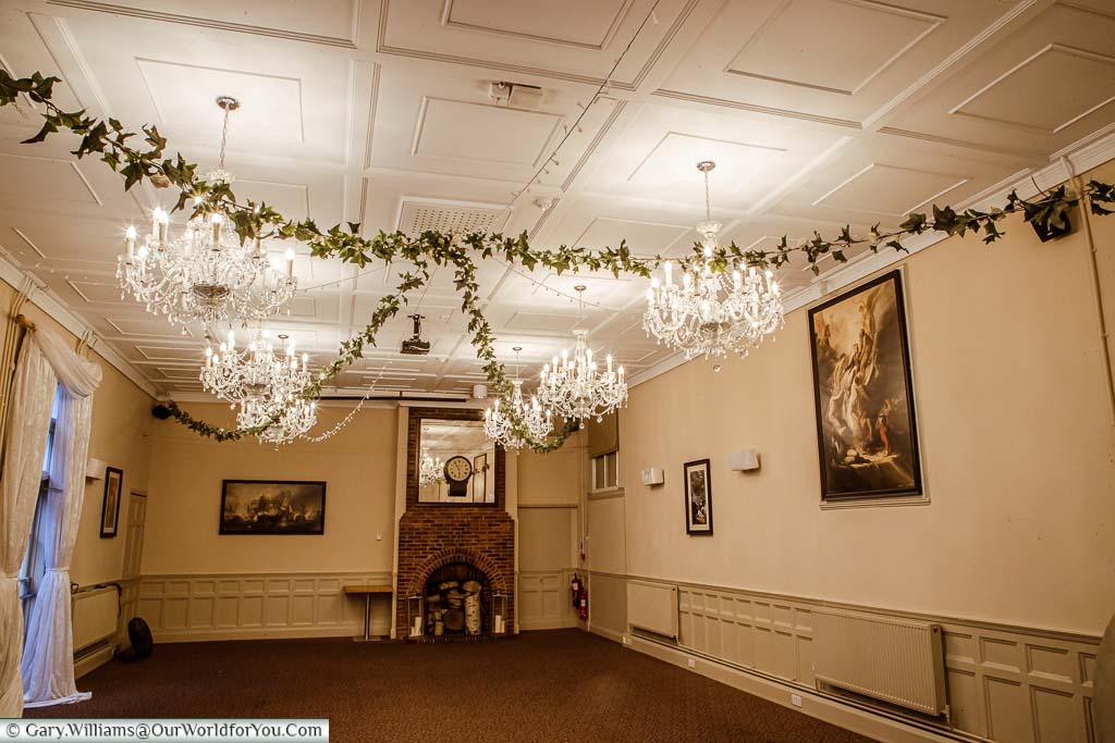One of the old buildings now converted to a function room with its ornate chandeliers, historical artwork, ready to set-up for somebody's special day.