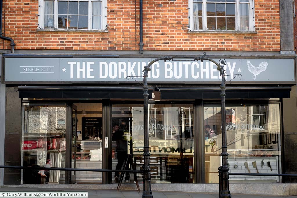 The Dorking Butchery in a traditional fronted building on the high street in Dorking.