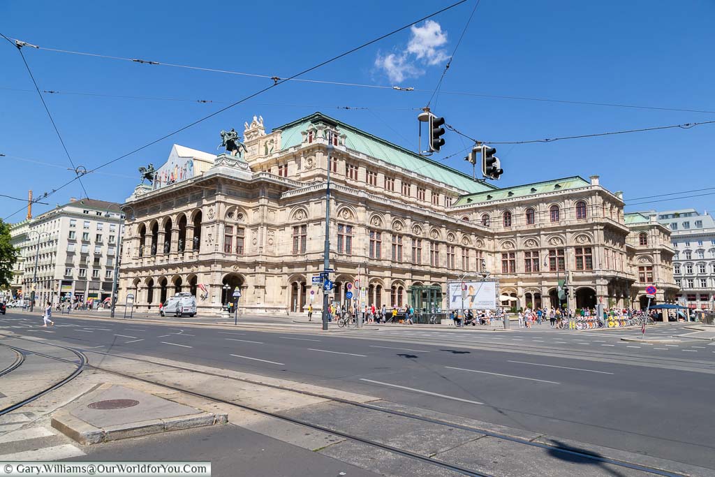 The ornate stone Vienna State Opera as seen from the opposite side of the city's inner ring road