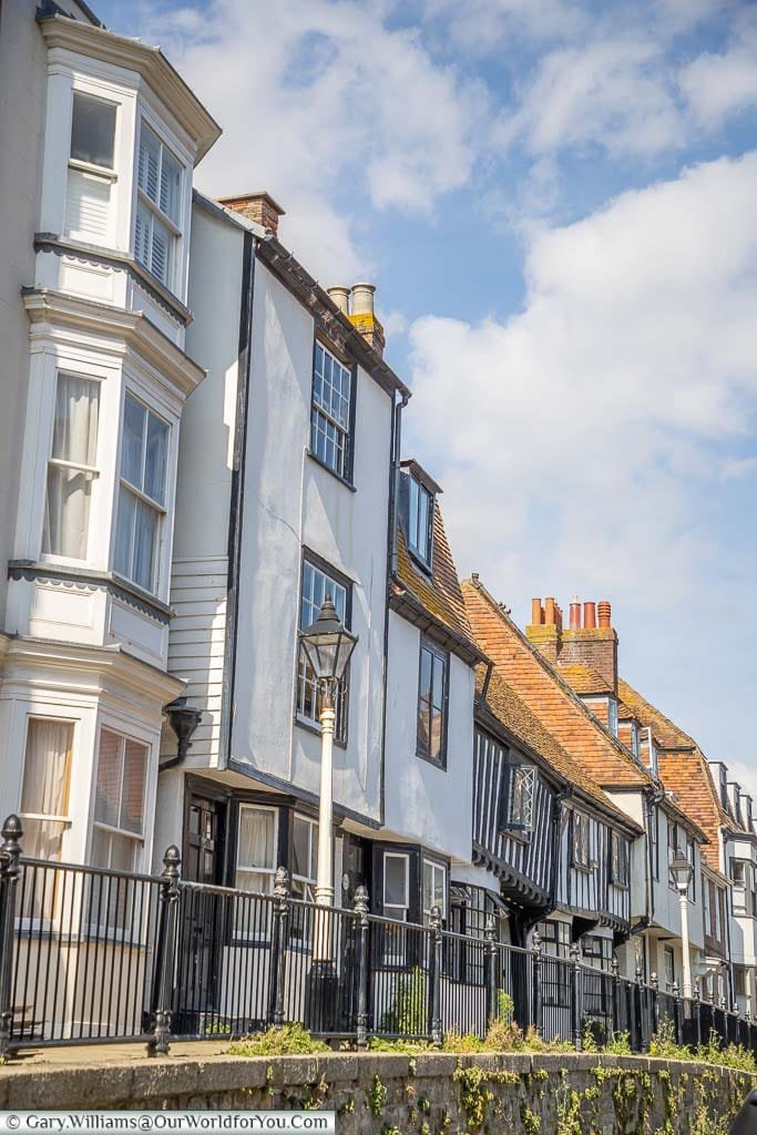 The mix of buildings along the historic terraced houses of Hastings High Street