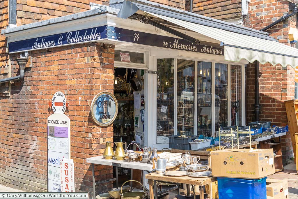 The collection of trestle tables outside antiques and collectables shop displaying all manner of bric-a-brac.