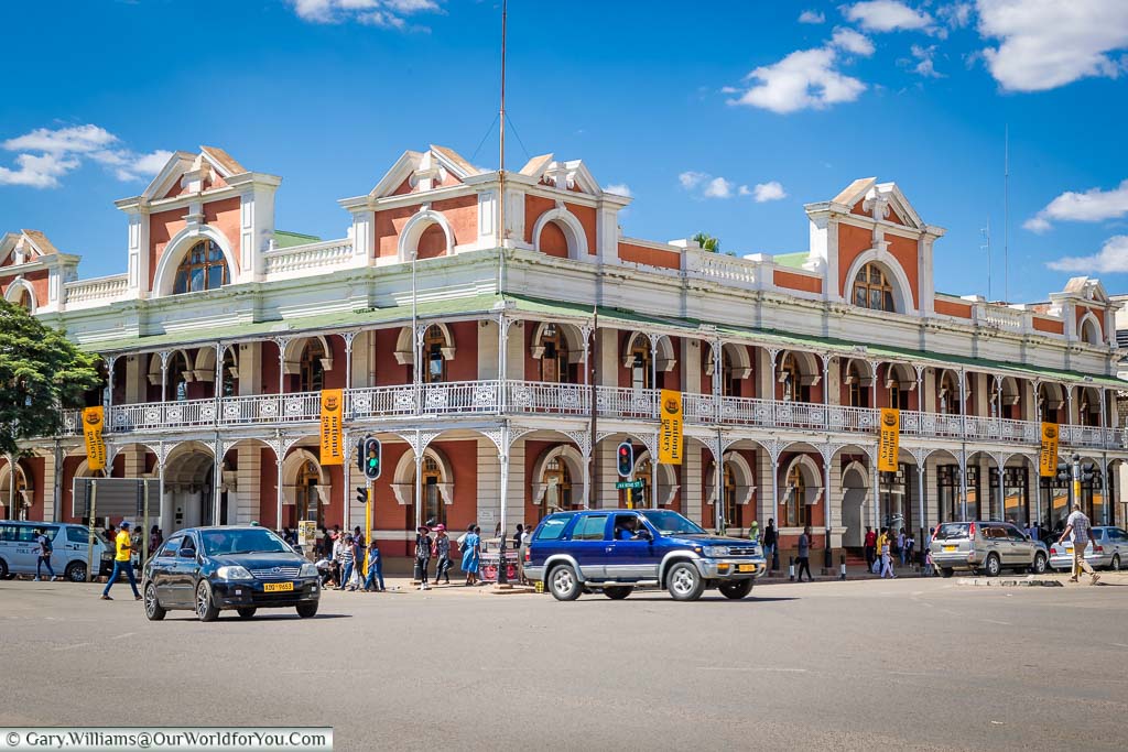 Looking across a busy junction at a colonial-era building that now houses the Bulawayo Art Gallery.
