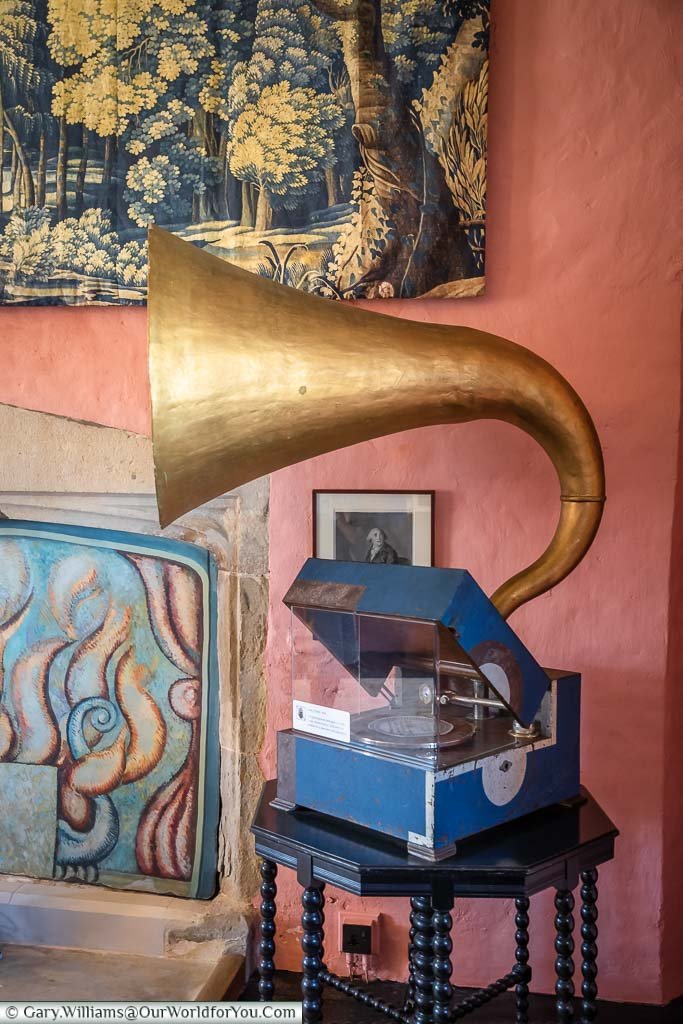 A 1930's gramophone with its large brass horn in the music room of the gatehouse tower of Knole house.