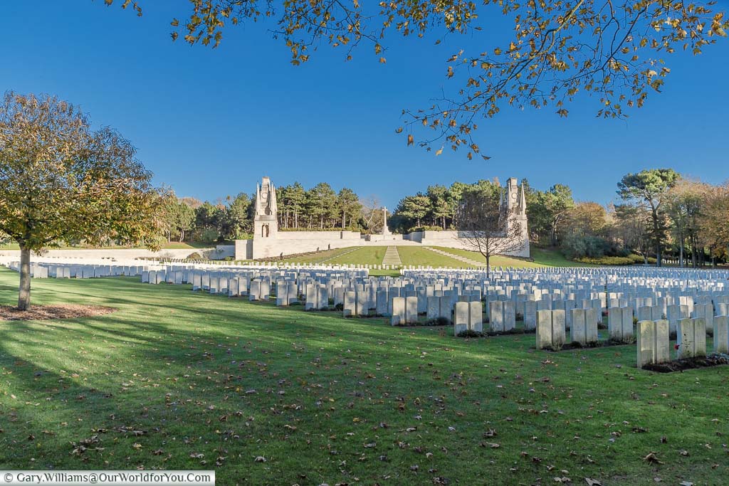 The Étaples Military Cemetery overlooking rows of headstones to the grand entrance to France's largest Commonwealth War Grave