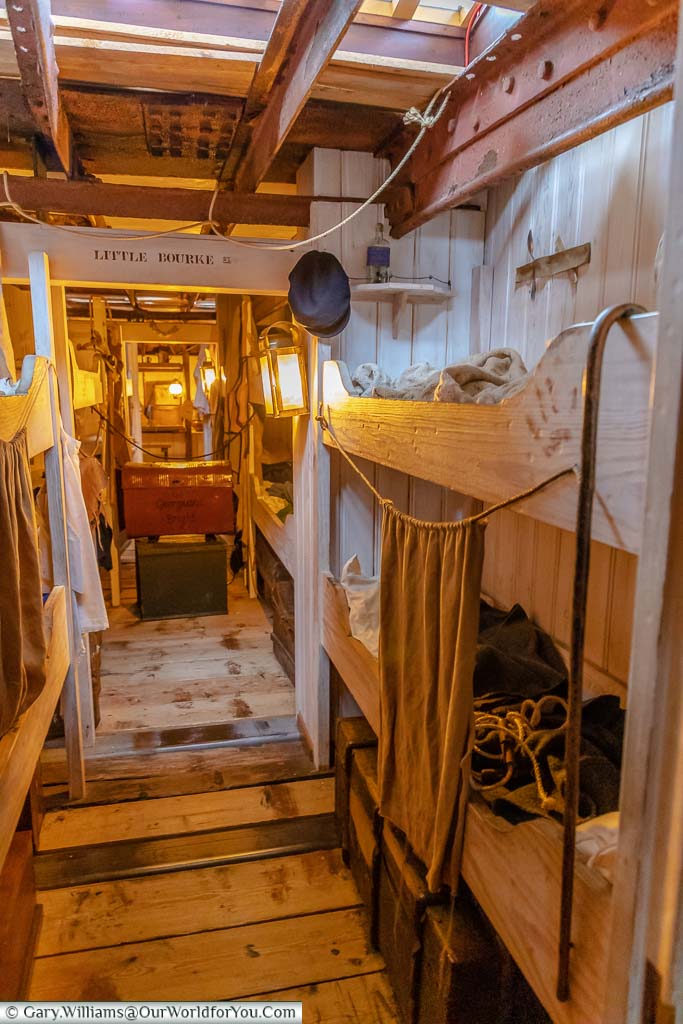 A pathway between the steerage bunks, offering little privacy, on board SS Great Britain.