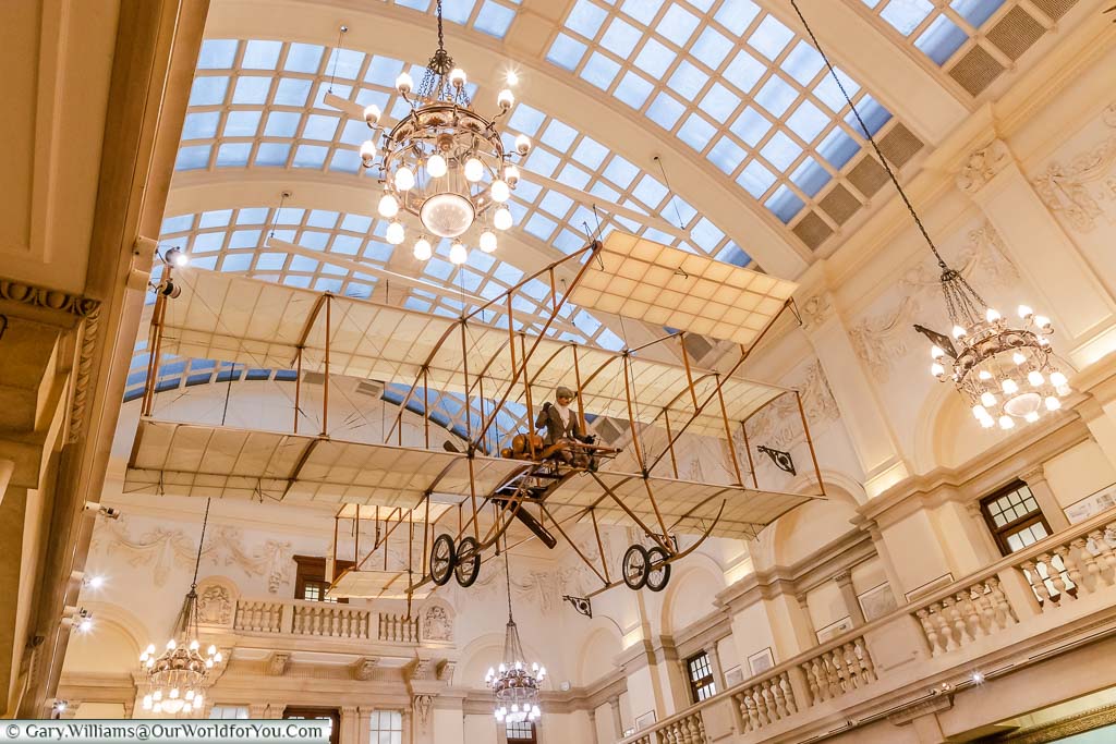A model of the Bristol Boxkite suspended from the ceiling of the classically styled Bristol Museum & Art Gallery