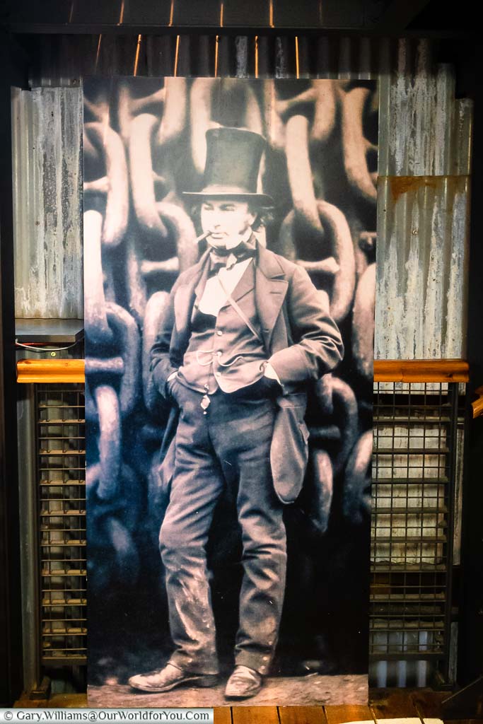 The familiar black and white picture of Isambard Kingdom Brunel standing in front of the giant iron chains of the SS Great Britain