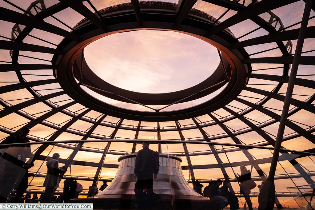 At the top of the glass dome of the Reichstag where a circular seating platform sits beneath a hole in the dome. Rainwater is collected through this hole and is used for utility functions within the building.