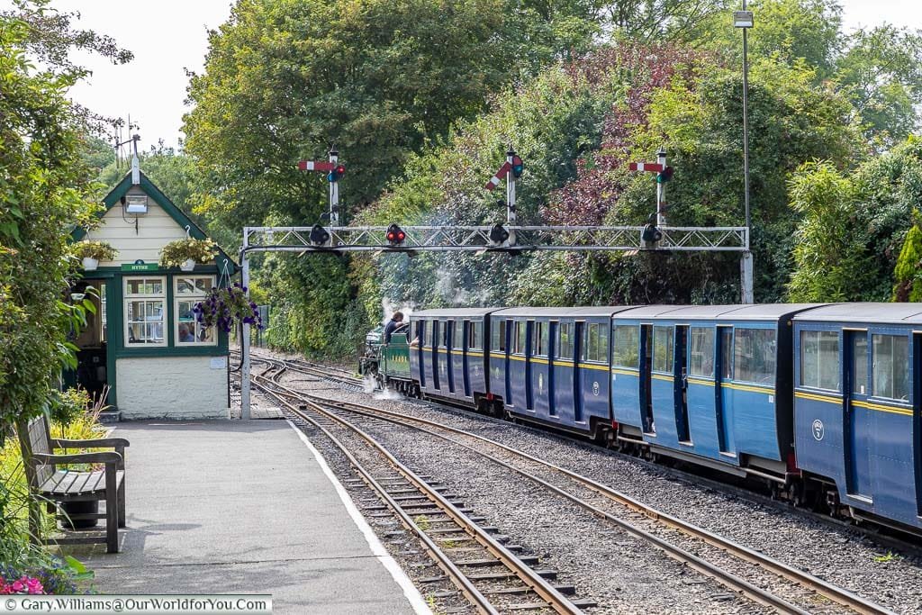 The engine and the first four carriages of the Romney, Hythe & Dymchurch Miniature Railway at Hythe station