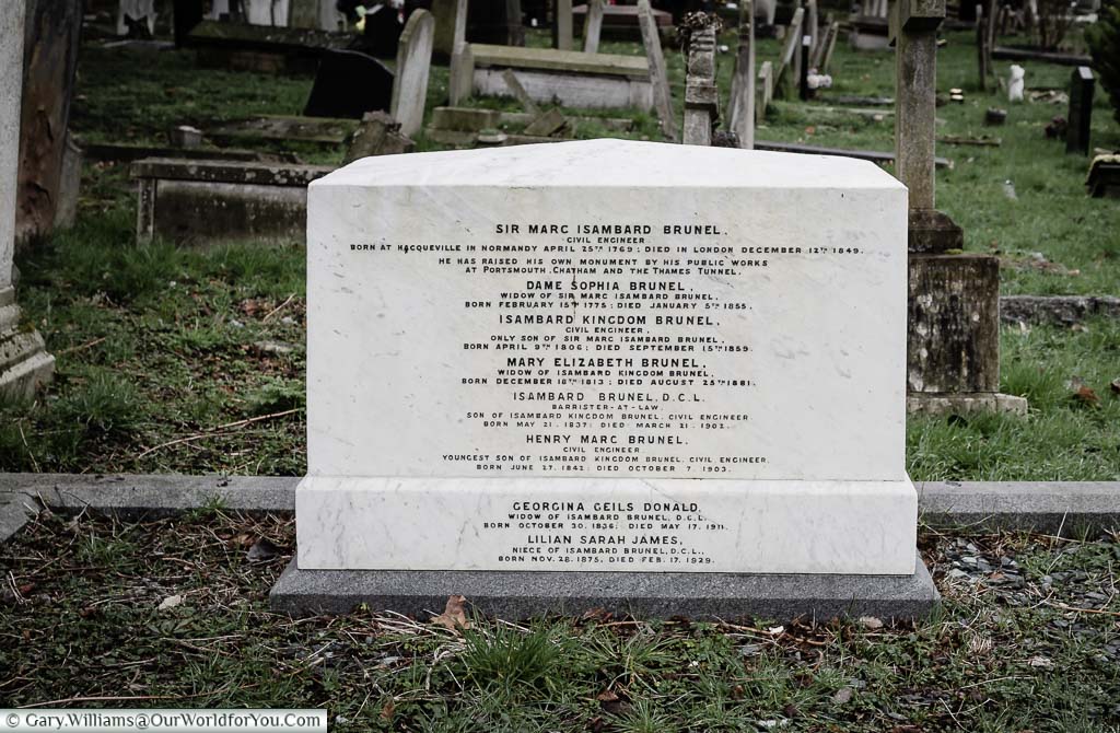 The white marble block headstone at the Brunel family plot that includes the graves of Sir Marc Isambard Brunel, and his son Isambard Kingdom Brunel at Kensal Green Cemetery