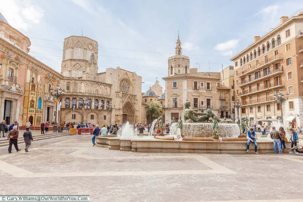 The Plaza de la Virgen in Valencia with the Neptune fountain taking centre stage with the city’s historic cathedral in the background.