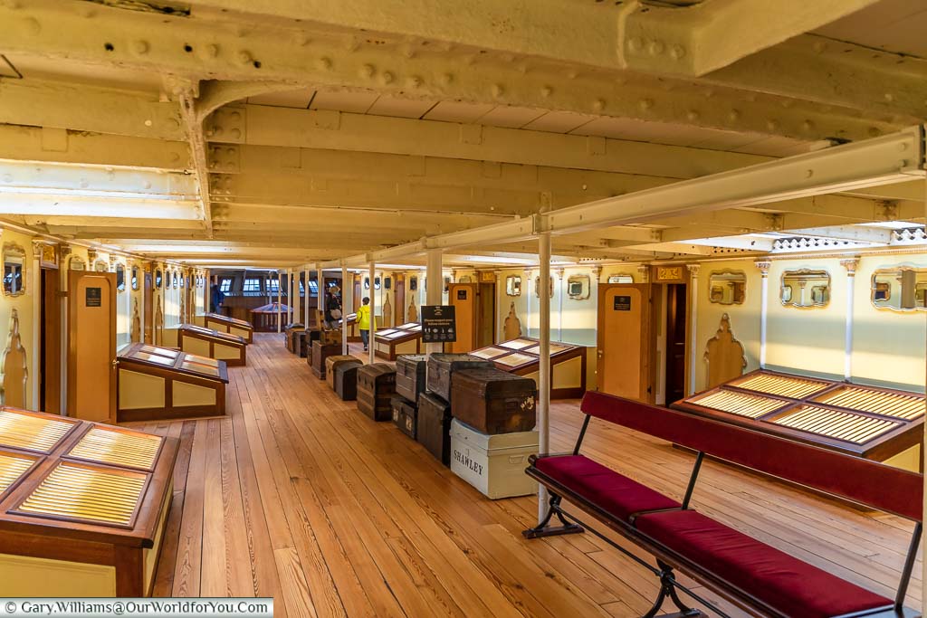 The wooden floor and open spaces of the Promenade Deck on SS Great Britain