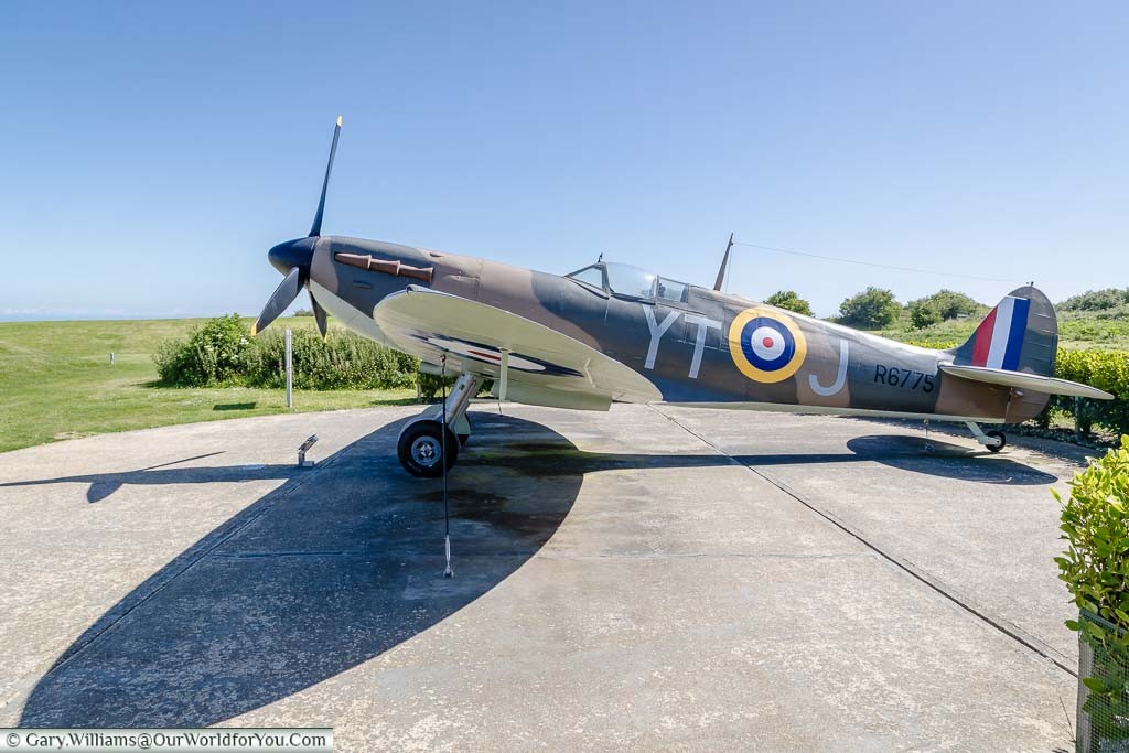 A full size replica of a world war two Spitfire outside at the Battle of Britain Memorial at Capel-le-Ferne, Kent,