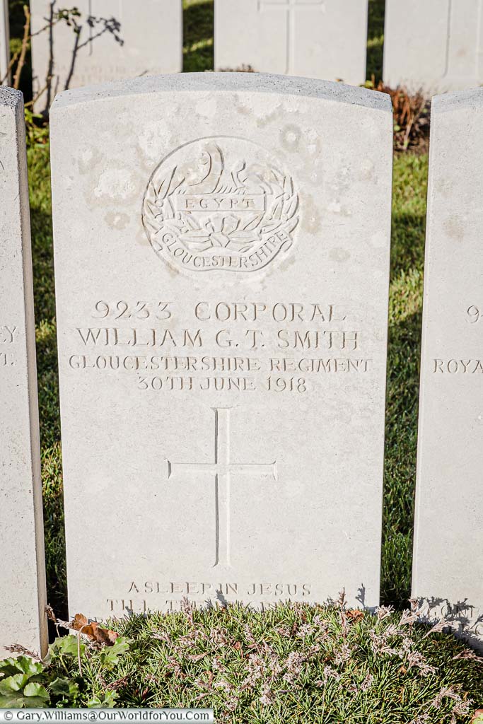 The headstone of Cpl Williams G T Smith in the Aire Communal Cemetery, France