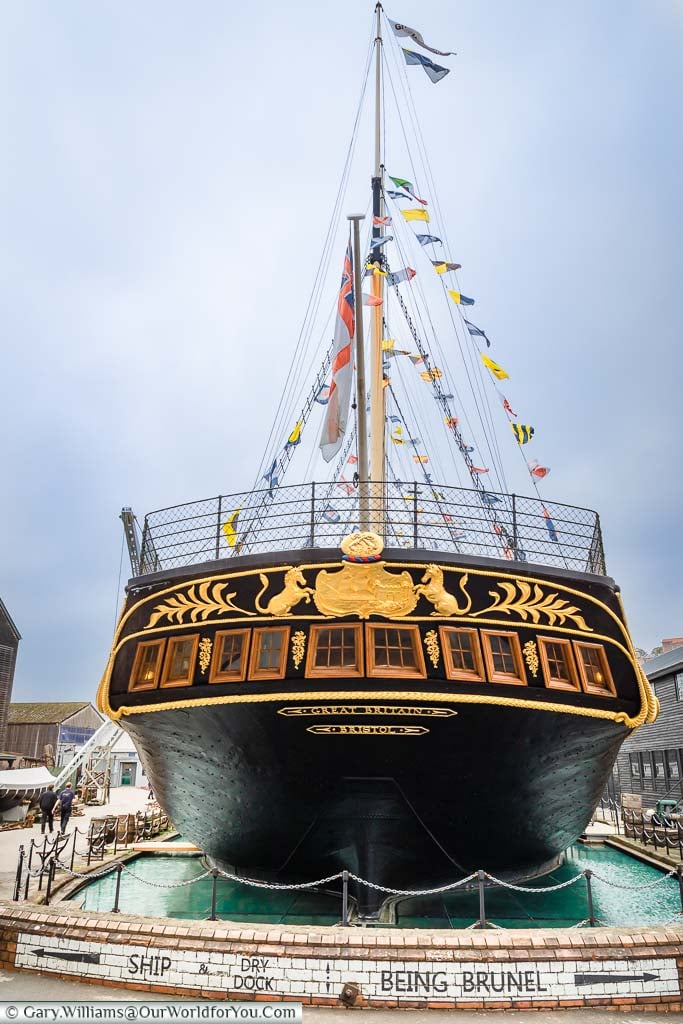 The aft or stern of the SS Great Britain in its dry dock in Bristol Harbour