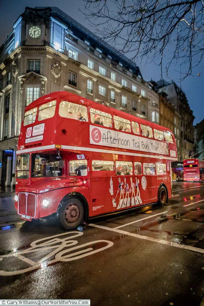 The Afternoon Tea Bus Tour in a traditional London Red Bus on the streets of London at Christmas