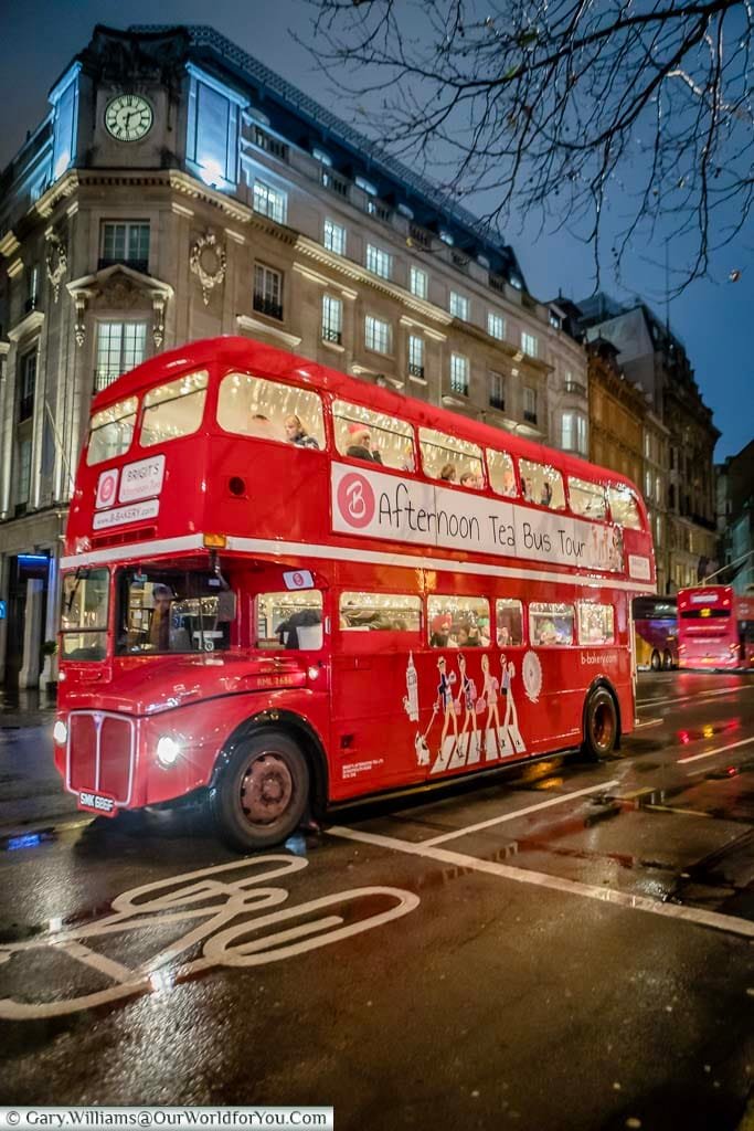 The Afternoon Tea Bus Tour in a traditional London Red Bus on the streets of London at Christmas