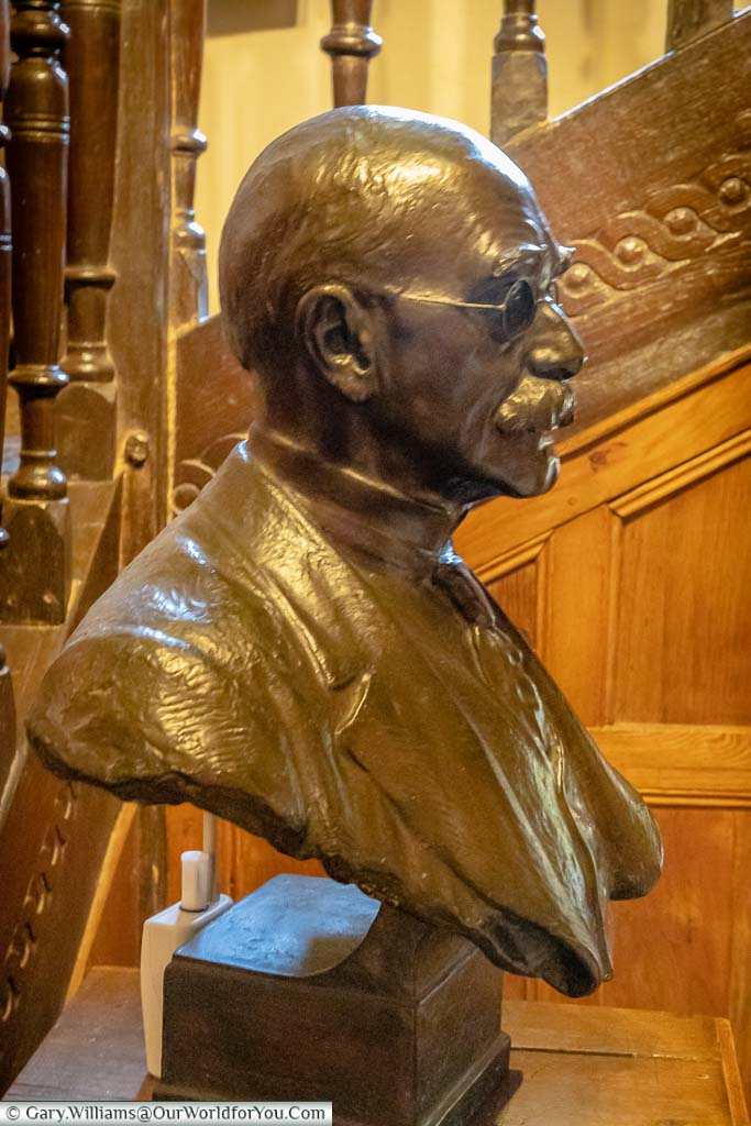 A bronze bust of Rudyard Kipling in the entrance lobby of Bateman's, National Trust, East Sussex, England