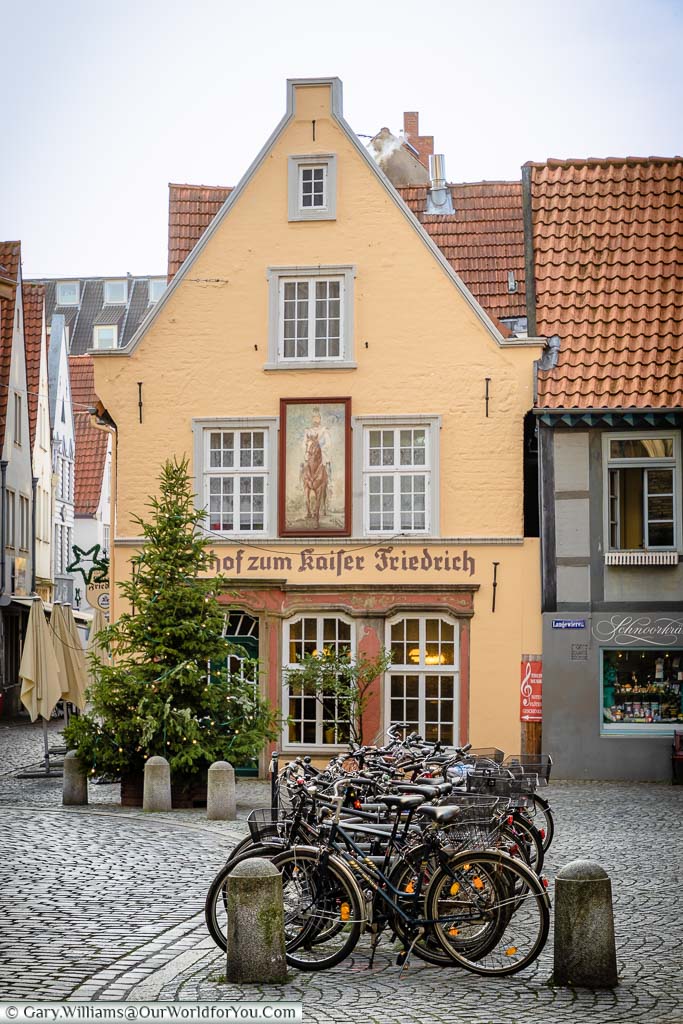 A row of bicycles outside a traditional restaurant in the Schnoor district of Bremen, Germany