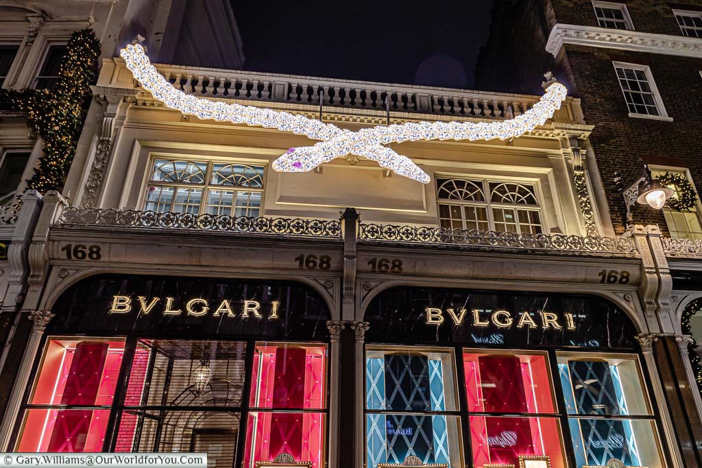 An illuminated white serpent with amethyst eyes above the Bulgari store in London’s New Bond Street.