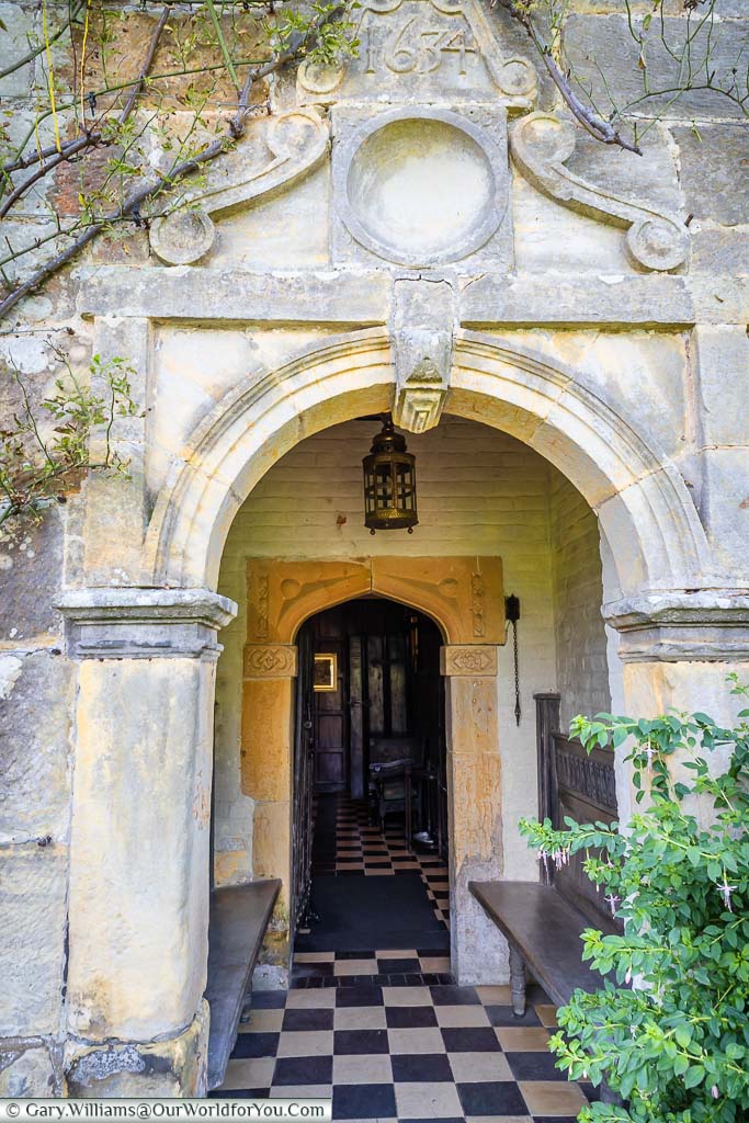 The year 1634 above the stone arch entrance to Rudyard Kipling's home, Bateman's.
