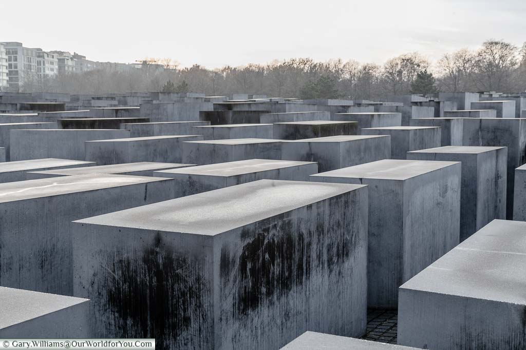 The mass of grey concrete blocks of the Berlin Holocaust Memorial